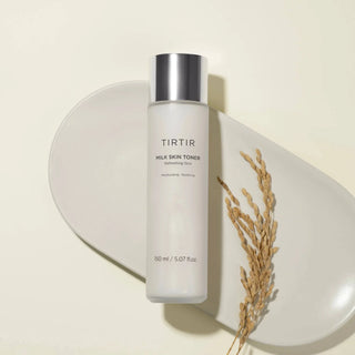 TIRTIR Milk Skin Toner 150mL bottle with white label and silver cap, placed on a clean surface.