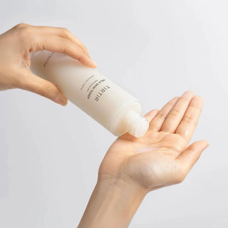 TIRTIR Milk Skin Toner 150mL bottle with clear liquid, designed for skincare and gentle facial toning.
