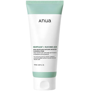 Anua Heartleaf Succinic Moisture Cleansing Foam in a 150mL bottle, showing the foam texture and brand label on the packaging.