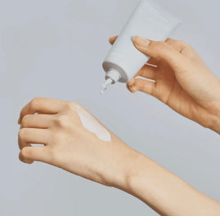 CELIMAX Dual Barrier Skin Wearable Cream in 50mL jar, showing the product packaging and cream texture for skin protection.