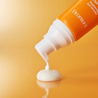 Deoproce Ultra Hydrating Sunscreen bottle with no white cast, suitable for all skin types, shown in the image.