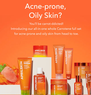 April Skin Carrotene Clarifying Serum bottle with white and orange label, 37mL, on a neutral background.