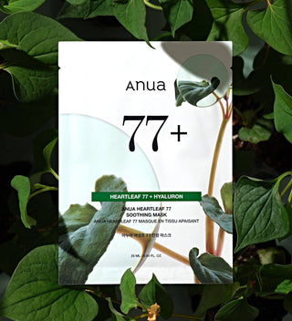 Anua Heartleaf 77% soothing face sheet mask lying flat, designed for calming and hydrating skin.