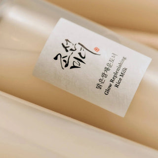 Beauty of Joseon Glow Replenishing Rice Milk toner in a 150mL bottle, featuring a soft, milky white liquid with rice grain details.