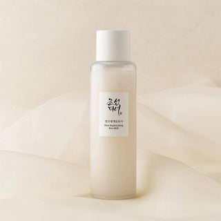 Beauty of Joseon Glow Replenishing Rice Milk toner bottle with white label and clear cap, showcasing a skincare product.