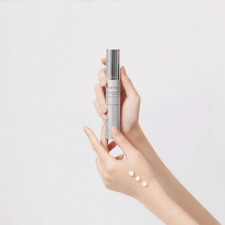 TIRTIR Collagen Lifting Eye Cream in 15mL jar, featuring a smooth cream texture for eye area skincare.