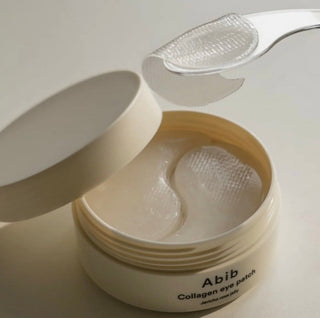 Abib Collagen Eye Patch Jericho Rose Jelly in a clear jar, showcasing the jelly texture with rose petals and collagen ingredients.