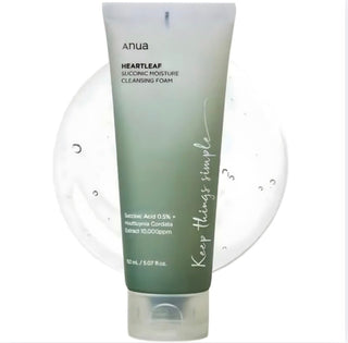 Anua Heartleaf Succinic Moisture Cleansing Foam in a 150ml bottle, with foaming texture and skincare branding visible.