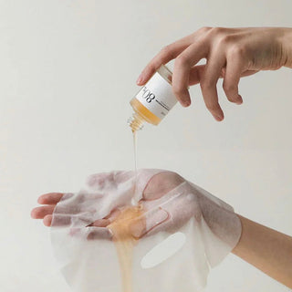 Anua Heartleaf 80 Moisture Soothing Ampoule Face Sheet Mask lying flat, showing the packaging with green leaf design and product name.