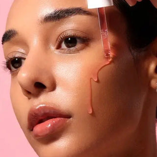 Bottle of ANUA Niacinamide 10% + TXA 4% serum with dropper applicator, designed for brightening and skin tone improvement.