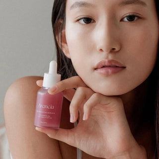 Arencia Red Smoothie Serum 8 in 30mL bottle, showcasing vibrant red serum in a sleek container.