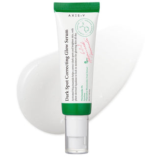 Axis-Y Dark Spot Correcting Glow Serum, a spot serum for anti-pigmentation, with a clear dropper and serum in a sleek bottle.