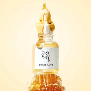 Beauty of Joseon Glow Serum with propolis and niacinamide, showcasing the serum's clear bottle and dropper applicator.