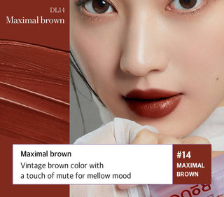Black Rouge Double Layer Over Velvet 2 lip tint in Fauvism Red, showing the sleek black and red packaging and product applicator.