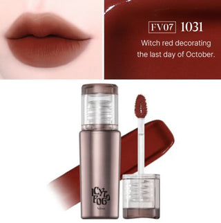 Black Rouge Icy to Fog Velvet Lip Tint in pink, showcasing the sleek black tube and vibrant lip shade.