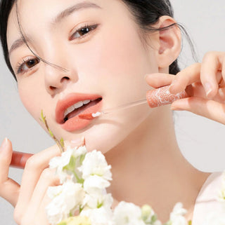 Black Rouge Cream Matt Rouge 3 lipstick in Delicate Rose, featuring a sleek black tube and soft, matte finish.