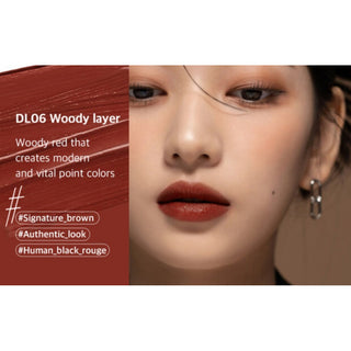 Black Rouge Double Layer Over Velvet lipstick in salmon color, showing the sleek black and velvet-textured packaging.