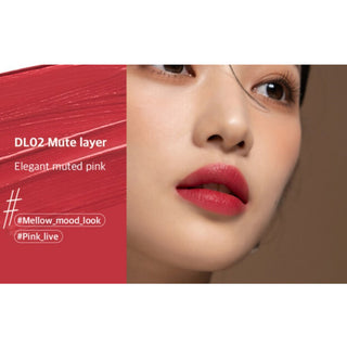 Black Rouge Double Layer Over Velvet lipstick in salmon shade, showcasing its sleek black and salmon layered design.