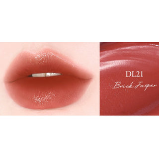 Black Rouge Double Layer Over Velvet 3 lipstick in amber carat shade, showcasing the sleek black and velvet packaging.