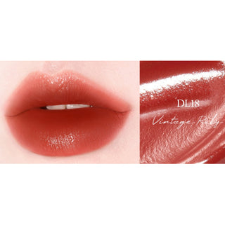 Black Rouge Double Layer Over Velvet 3 lipstick in amber carat shade, featuring sleek black packaging and smooth texture.