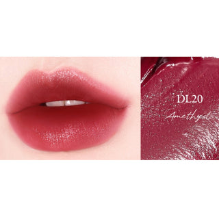 Black Rouge Double Layer Over Velvet 3 lipstick in amber-carat shade, featuring a sleek black tube and rich, velvety finish.