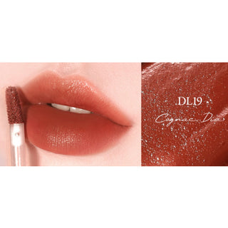 Black Rouge Double Layer Over Velvet 3 lipstick in amber carat shade, featuring a sleek black and gold tube with the lipstick visible.