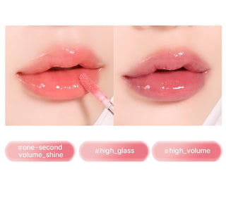 Black Rouge Chewy Lip Glaze lipstick in a sleek black tube, with glossy, vibrant lip color visible.