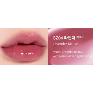 Black Rouge Chewy Lip Glaze lipstick in sleek black packaging with a glossy finish.