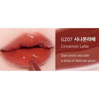 Black Rouge Chewy Lip Glaze lipstick in a sleek black tube with a glossy finish, ready for smooth, vibrant lip color application.