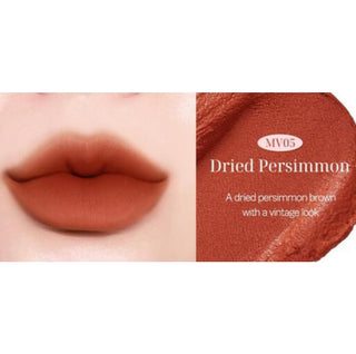 Black Rouge Muddish Cushion Velvet lipstick in Peach Pudding, showing a smooth, velvety black lipstick bullet with peach undertones.