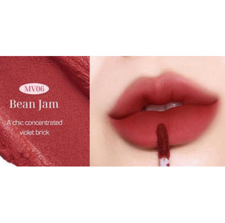 Black Rouge Muddish Cushion Velvet lipstick in peach pudding shade, showcasing the smooth, velvet-textured bullet with vibrant color.