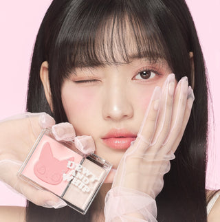 Black Rouge Dewy Whip Cheek and Beam makeup product in strawberry shade, showcasing creamy texture and vibrant color.