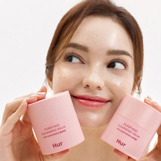 House of Hur Purifying Cleansing Balm 50mL in a sleek jar, showing the creamy balm texture ready for skincare use.