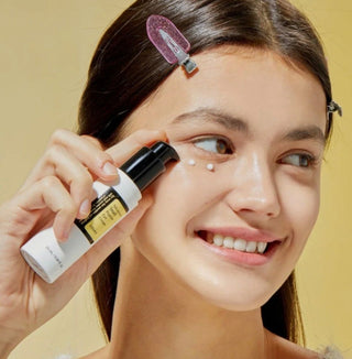 COSRX Advanced Snail Peptide Eye Cream in a 25ml jar, featuring a sleek design and creamy texture for eye area skincare.