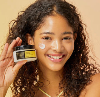 Cosrx Advanced Snail 92 All-In-One Cream moisturizer jar with white lid and branding on the label.