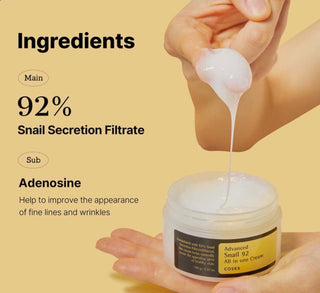 Cosrx Advanced Snail 92 All In One Cream moisturizer jar with white and silver packaging and product label visible.