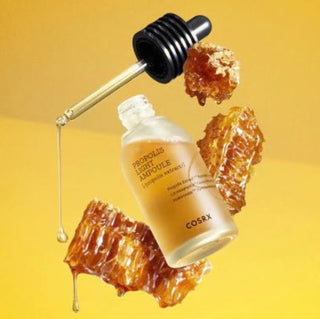 CosRX Full Fit Propolis Light Ampoule serum bottle with clear label, featuring a dropper cap and a natural, light-colored background.