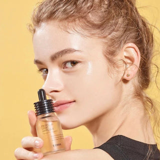 CosRx Full Fit Propolis Light Ampoule serum in a sleek dropper bottle, featuring a clear liquid formula for nourishing skin.