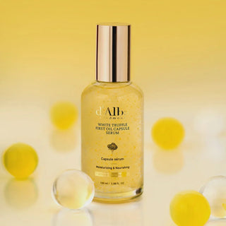 D'Alba White Truffle First Oil Capsule Serum in a 100ml bottle, featuring a sleek glass container with a dropper cap.