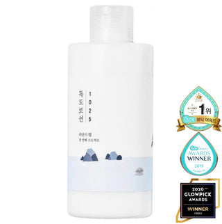 Damaged box of Round Lab 1025 Dokdo Lotion emulsion with 70 Medicube Zero Pore Pads in a sealed package.