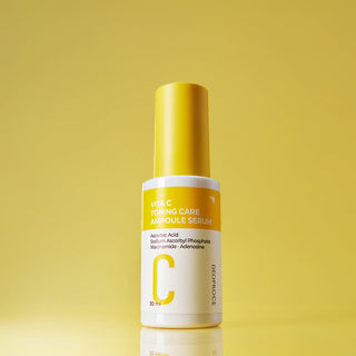 Deoproce Vita C toning care ampoule serum in a clear bottle with a dropper, designed for brightening and skin hydration.