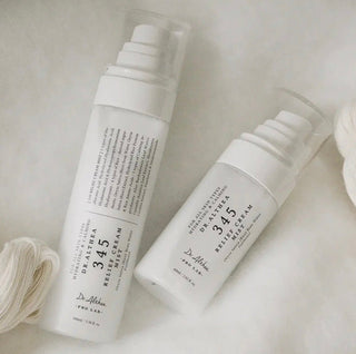 Dr. Althea 345 Relief Cream Mist bottle with spray nozzle, light-colored label, and clear packaging, showcasing the product.