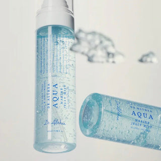 Dr. Althea Aqua Marine Jelly Mist 100ml, clear spray bottle with misting nozzle, showcasing the hydrating face mist inside.