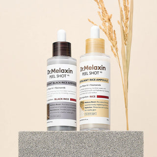 Dr.Melaxin Peel Shot Exfoliating Black Rice Ampoule 80ml bottle with black and gold label, skincare product for exfoliation.