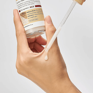 Dr.Melaxin Peel Shot Exfoliating White Rice Ampoule 80ml, a skincare product for gentle exfoliation and brightening.