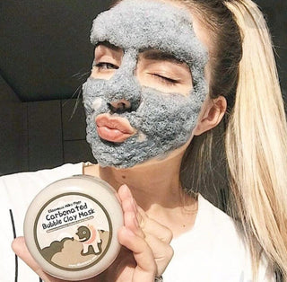 Elizavecca Milky Piggy Carbonated Bubble Clay Mask 100g, a clay face mask with a bubbly foam texture in a jar.