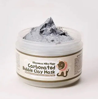Elizavecca Milky Piggy Carbonated Bubble Clay Mask 100g in a jar, showing the creamy white face mask with playful pig branding.