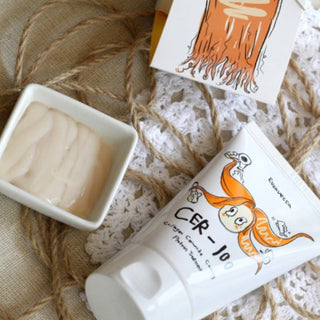 Elizavecca CER-100 Collagen Coating Protein Treatment bottle, hair care product for nourishing and strengthening hair.