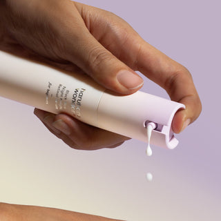 Haruharu Wonder Black Rice Night Knight Retinol Serum 20mL, a dark bottle with dropper, showcasing skincare product and branding.