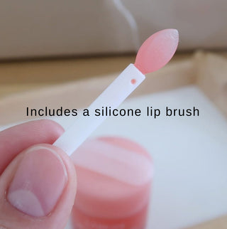 Laneige Lip Sleeping Mask EX in pink, a hydrating overnight lip treatment in a small jar with a smooth, glossy finish.
